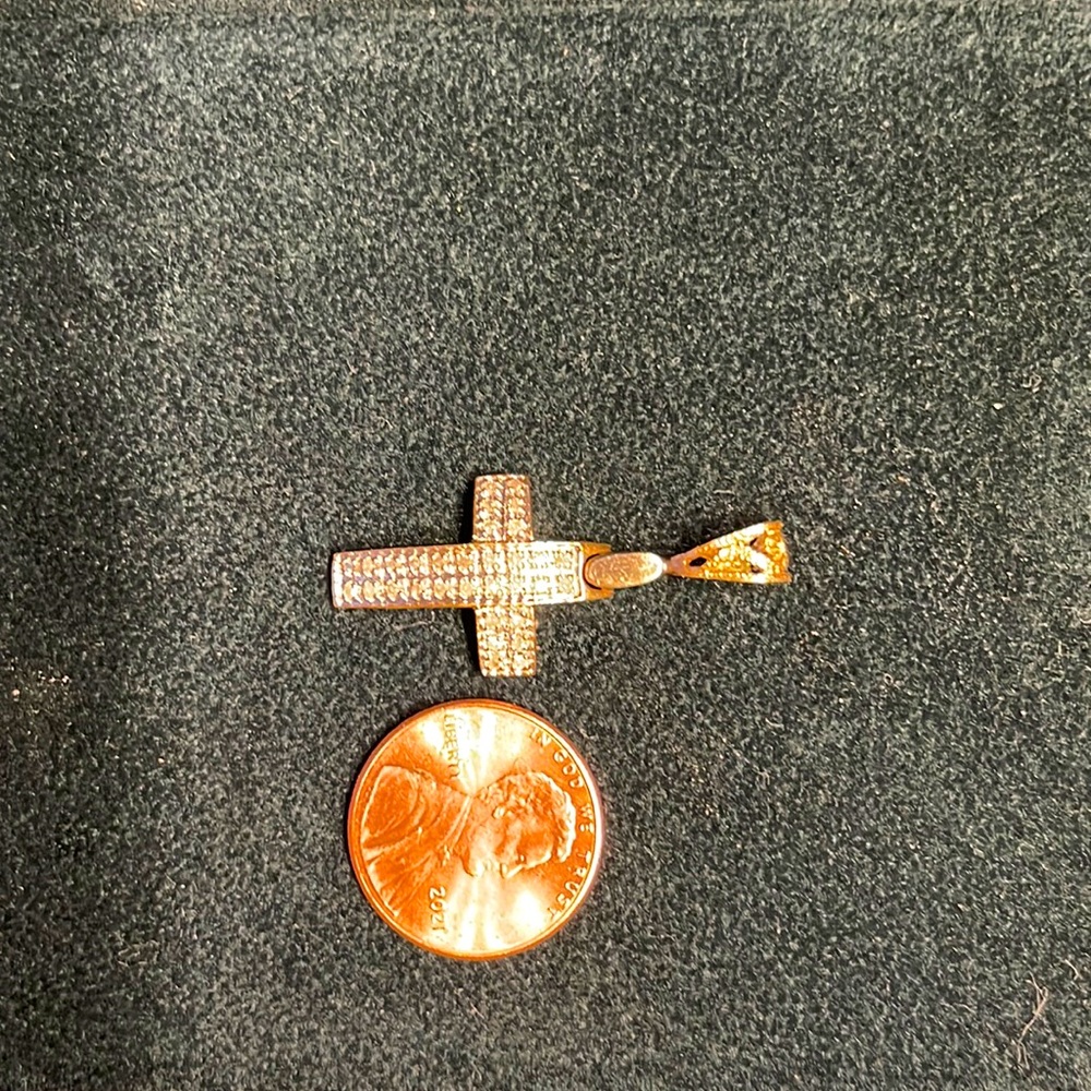 Gold cross pendant